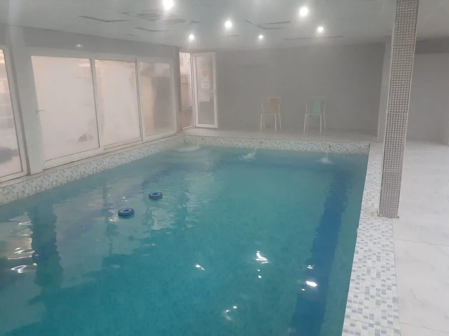 تصویر ۱ - ویلا ویلاباغ شهری با استخر آبگرم سرپوشیده و تصفيه اتوماتیک  در  کرمانشاه