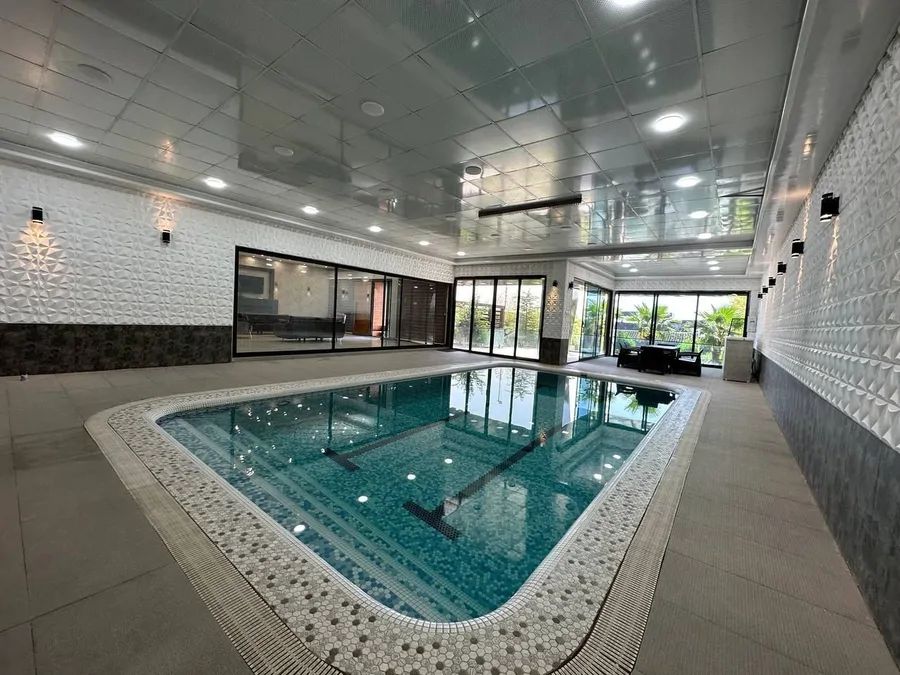 تصویر ۱ - ویلا استخردار آبگرم افشاریه با زمین والیبال در کردان