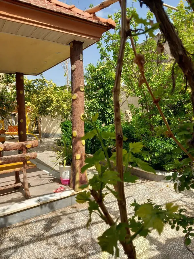 تصویر ۱ - ویلا منزل فوق دارای باربیکیو آلاچیق تاب برای بازی کودکان سرسبز در کاشان
