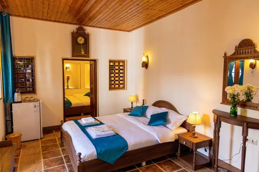 تصویر ۱ - اقامتگاه بوم‌گردی حاج رئیس (اتاق رسول شوقی) با صبحانه رایگان در  بوشهر