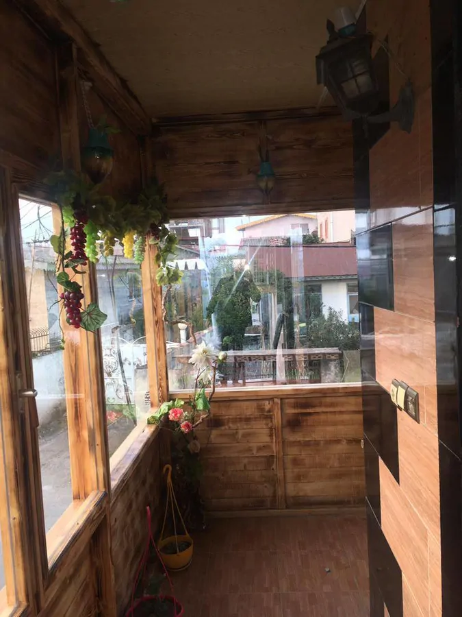 تصویر ۱ - خانه مبله ساحلی ایوان چوبی در  انزلی