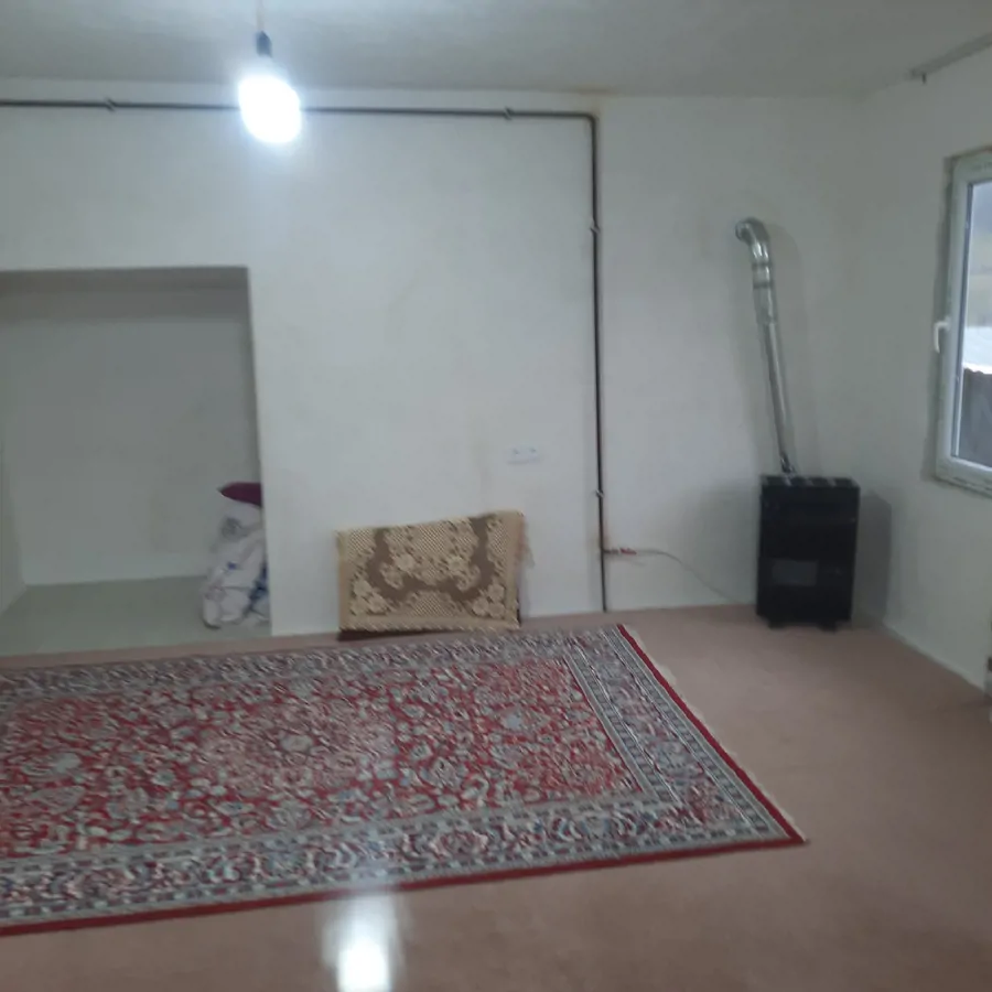 تصویر ۱ - خانه چشمه قدیمی نظری محله در  رودبار