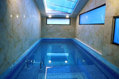 تصویر 2 - کلبه شهرک کلبه چوبی لوکس و تمیز با استخر آب گرم تصفیه تمام وقت در عباس آباد