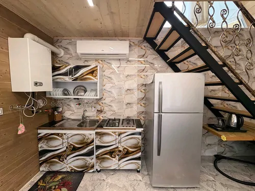 تصویر 6 - کلبه چوبی با نمای شیشه ای چیمه در شاندرمن