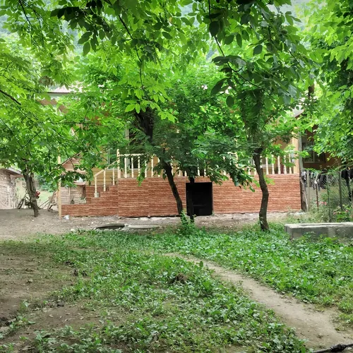 تصویر 23 - کلبه چوبی‌ میربلوک کنار رودخانه در  ماسال