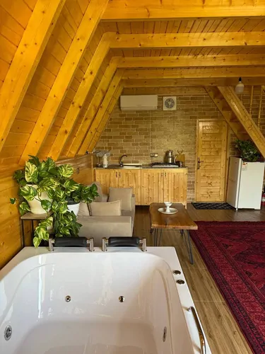 تصویر 4 - کلبه کلبه سوئیسی تک خواب جکوزی دار مهرآ در سوادکوه