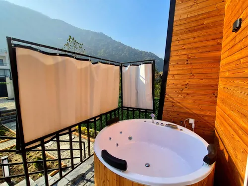 تصویر 6 - کلبه جنگلی نیک با جکوزی  در  هچیرود