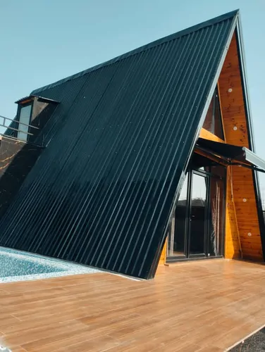 تصویر 3 - کلبه کلبه سوئیسی با استخر و تراس دلباز در آستانه اشرفیه