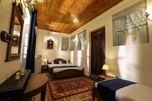 تصویر 2 - اقامتگاه بوم‌گردی حاج رئیس (اتاق غلام فرج زاده) با صبحانه رایگان  در بوشهر