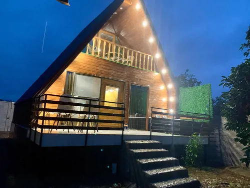 تصویر 15 - کلبه سوئیسی عادل با جکوزی کنار رودخانه در  بابل کنار