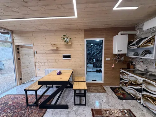 تصویر 5 - کلبه چوبی با نمای شیشه ای چیمه در شاندرمن