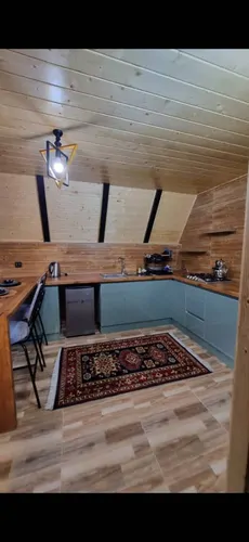 تصویر 4 - کلبه کلبه جنگلی روهام با چشم انداز زیبای کوه وجنگل واقع درمکانی دنج وآرام  در رامسر