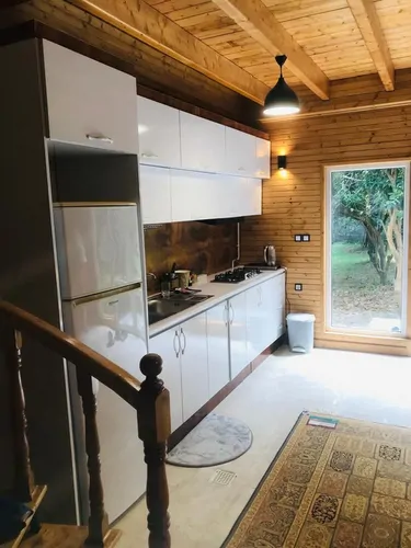 تصویر 8 - کلبه سوییسی باغ پرتقال با جکوزی در  چابکسر