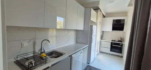 تصویر 19 - آپارتمان لوکس مال تپه نزدیک دریا (طبقه دوم) نزدیک خیابان بغداد در  استانبول